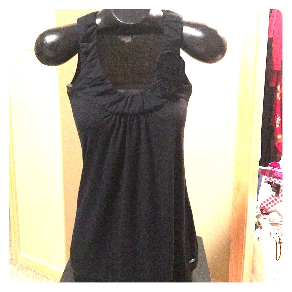 Tank top.  Dress it up or wear it with jeans